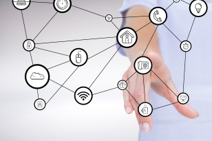 Composite image of hand touching graphic technological icons with white background